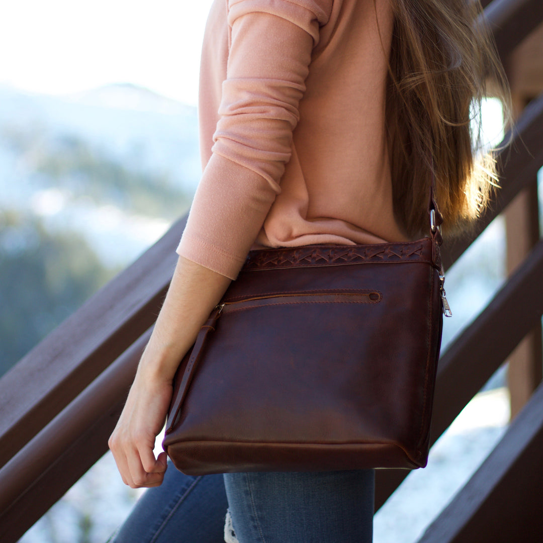 Model wearing Style "Faith" | Concealed Carry Crossbody/Shoulder Bag | Full Grain Leather | By Lady Conceal