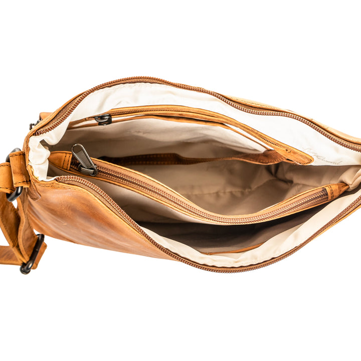 Style "Blake" | Concealed Carry Crossbody with Criss-Cross Stitching and removable tassel accents | Inside View | By Lady Conceal
