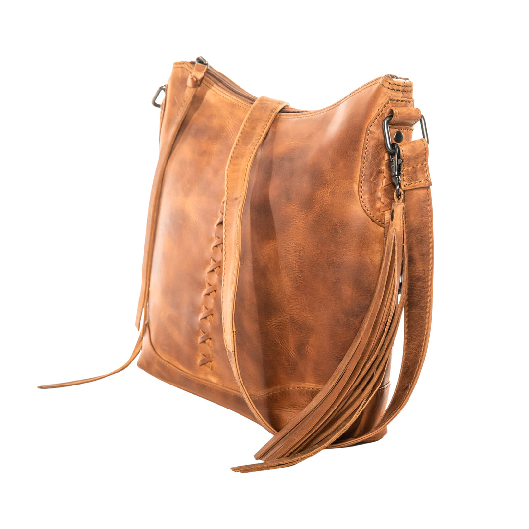 Style "Blake" | Concealed Carry Crossbody with Criss-Cross Stitching and removable tassel accents |Side View | By Lady Conceal
